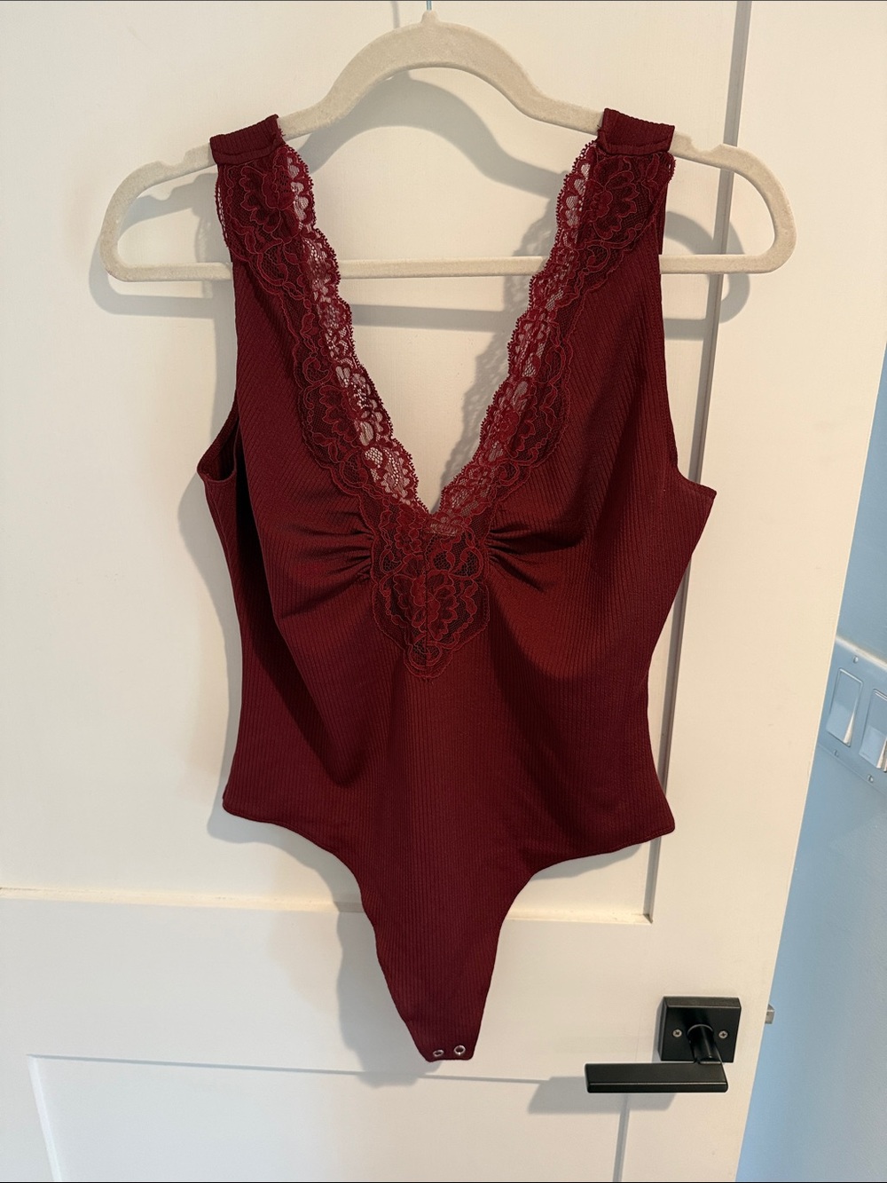 Free People Lace Trim Deep V Ribbed Bodysuit in Wine